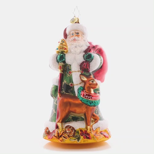 Video - Ornament Description - Autumn Colors: The ninth piece in our Ornament of the Month collection celebrates autumn! Festive as ever for the fall harvest, Santa is sporting a lovely leaf-covered cloak.