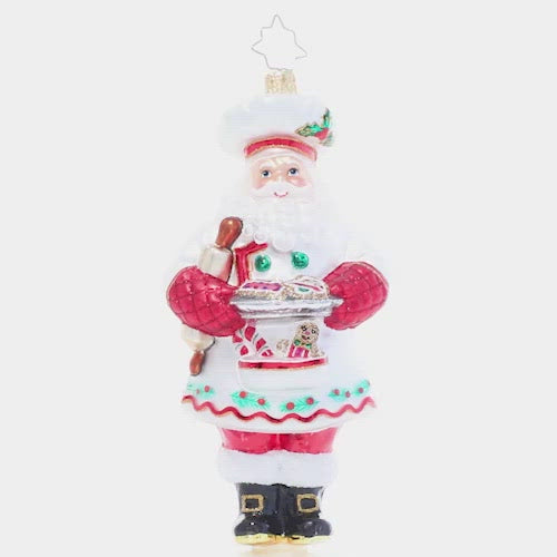 Video - Ornament Description - Cheerful Christmas Confectioner: A man of many talents, it should come as no surprise that Santa is a masterful Christmas cookie baker. He'll never share his secret ingredient, but we have a feeling it has to do with a little Christmas magic!