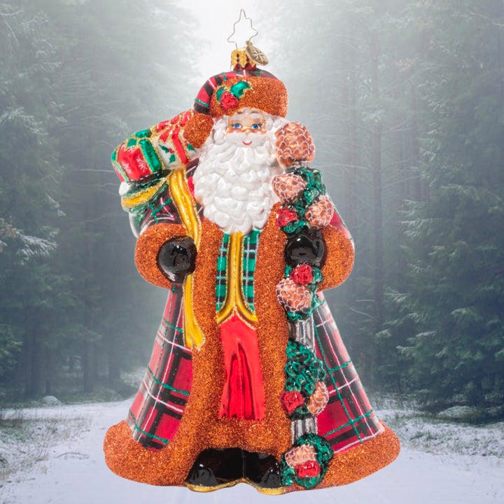 Ornament Description - Perfectly Plaid Santa: This Hebridean Santa puts a stylish twist on the traditional Santa look. He's perfect in plaid with his fur-trimmed outfit and toque – cozy as can be!