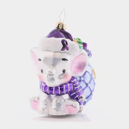 Video - Ornament Description - An Elephant Never Forgets!: An elephant who never forgets to treat others, no matter what they're going through, with compassion, love, and respect. A percentage of the sales from this ornament will benefit Alzheimer’s awareness.