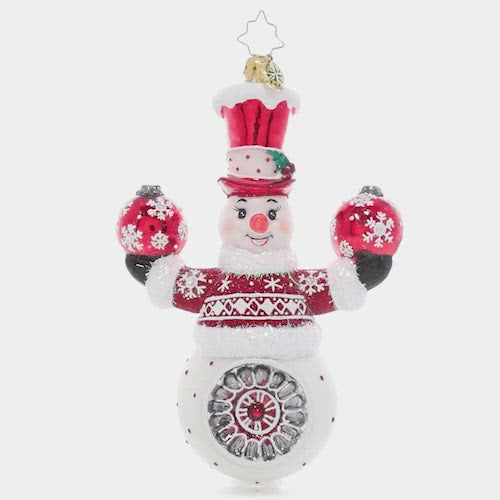 Video - Ornament Description - Cheery Snowman Juggler: This acrobatic snowman is ready to demonstrate his tricks and spread good cheer by juggling two festive Christmas ornaments.