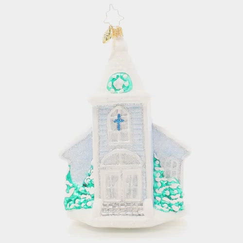 Video - Ornament Description - White Christmas Chapel: Nestled in new-fallen snow, this glistening chapel is what white Christmas dreams are made of! Hang it from your tree to remind you of the warmth that comes from gathering together to celebrate the reason for the season. This video shows the ornament spinning slowly. 