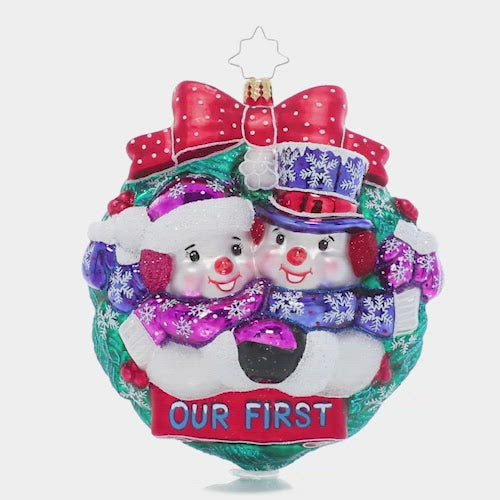 Video - Ornament Description - Snowy First Christmas: Love – and snowflakes! – are in the air! Commemorate your first holiday season together with this adorable snow couple in love. This video shows the ornament spinning slowly. 